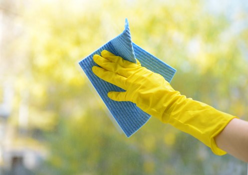 Facade cleaning service on a Hackney building exterior