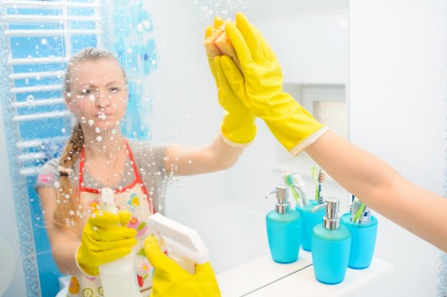 Local cleaners carrying out deep cleaning in a Hackney flat